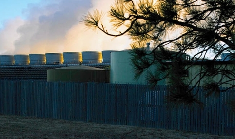 Image of power plant boilers and steam turbines.